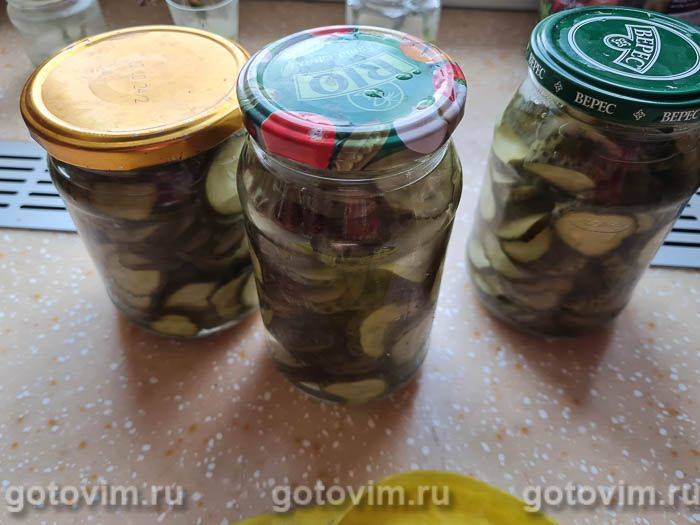 Хрусткі мариновані огірки кружечками . Фотографія рецепта